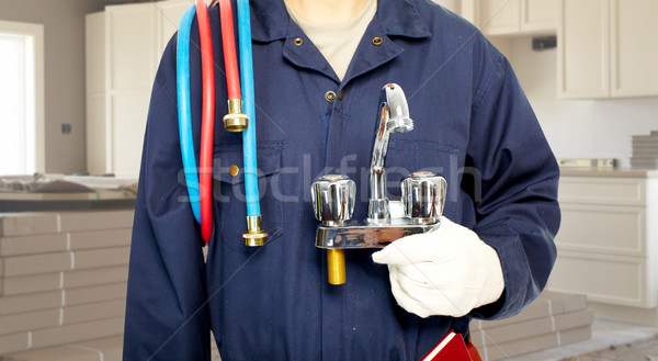 Vízvezetékszerelő kezek vízcsap konyha kéz férfi Stock fotó © Kurhan