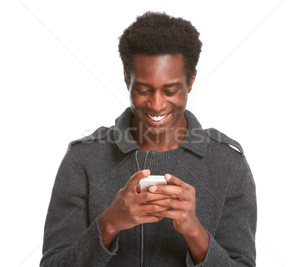 Homem negro africano americano moço celular isolado Foto stock © Kurhan