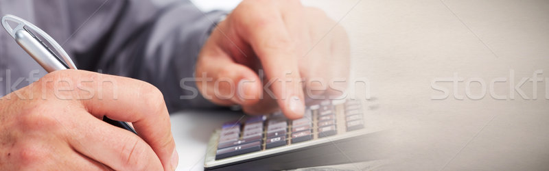 Accountant hands with calculator Stock photo © Kurhan