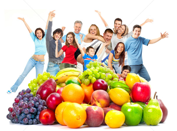 Boldog emberek csoport gyümölcsök fehér nő család Stock fotó © Kurhan