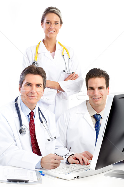 Medycznych lekarzy uśmiechnięty komputera odizolowany biały Zdjęcia stock © Kurhan