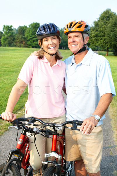 Starszy para rowerowe szczęśliwy starszych parku fitness Zdjęcia stock © Kurhan