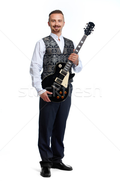 Young singer man with guitar. Stock photo © Kurhan