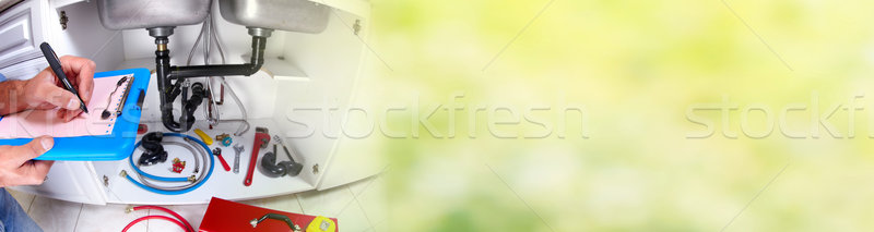 [[stock_photo]]: Main · plombier · clé · mains · professionnels · plomberie