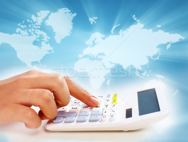 Hands of business people with calculator. Stock photo © Kurhan