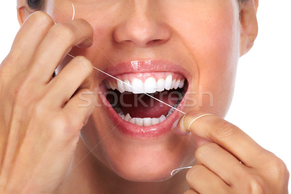 Foto stock: Mujer · dientes · hilo · dental · odontología · nina