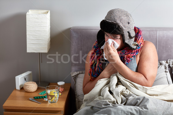 Sick man in bed Stock photo © Kurhan