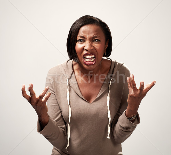 Angry african american woman Stock photo © Kurhan