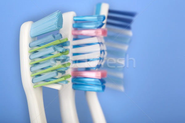 Stok fotoğraf: Diş · arka · plan · mavi · dişler · temizlik · fırçalamak