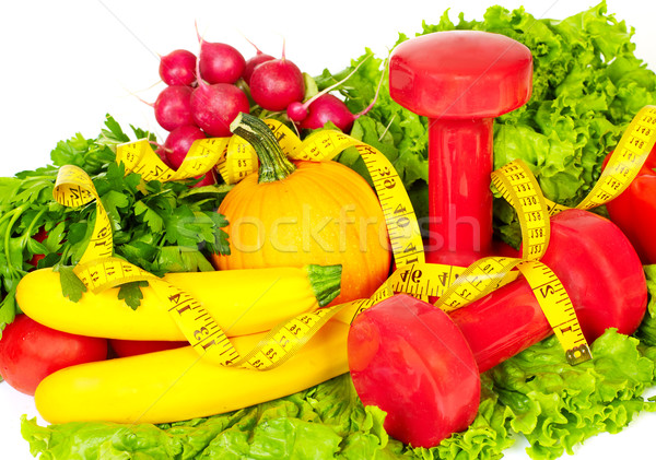 Fresh vegetables and dumbbells. Stock photo © Kurhan