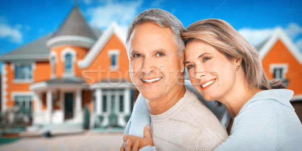 Senior Couple near new house. Stock photo © Kurhan