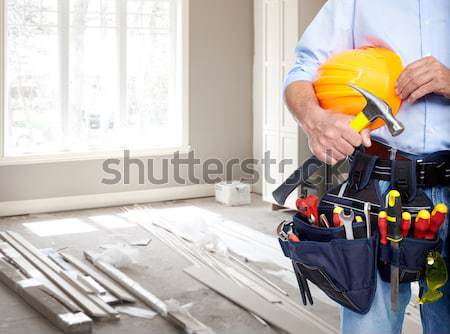 Plumber hands with clipboard. Stock photo © Kurhan