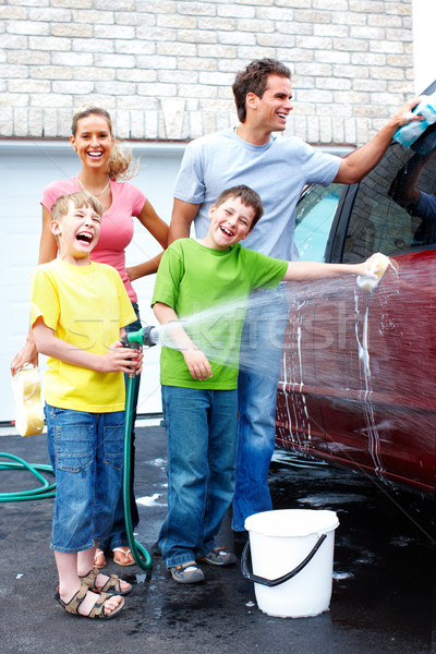 Happy family washing the family car. Stock photo © Kurhan
