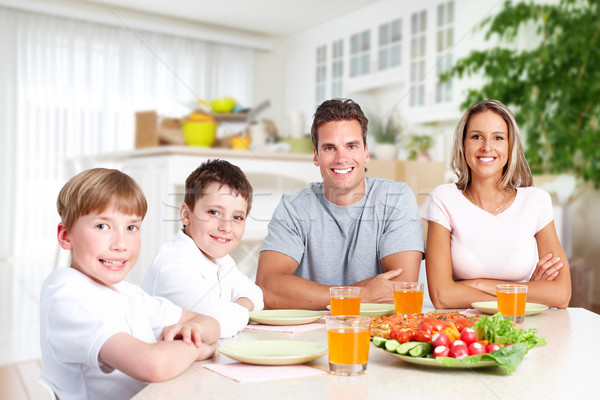 Happy family in a new house. Stock photo © Kurhan