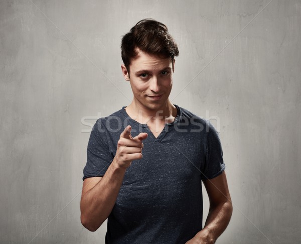 Stock photo: Man pointing to the camera