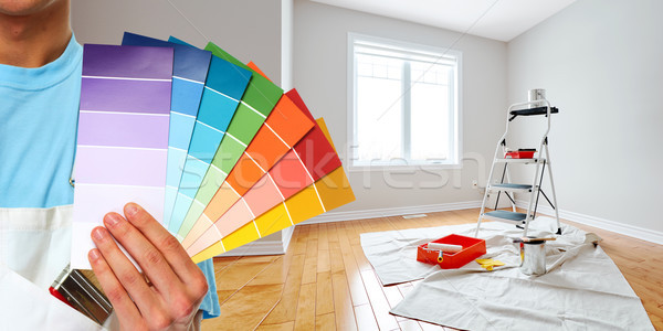 Painter hand with colors Stock photo © Kurhan