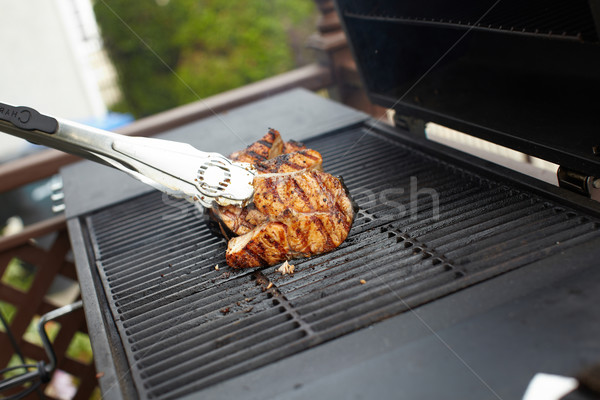 Stock photo: Salmon fish roast on barbecue grill.
