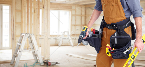 Builder handyman in new house. Stock photo © Kurhan