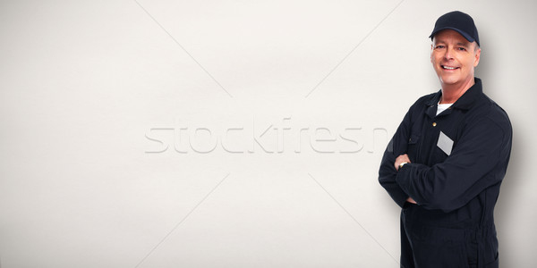 érett autószerelő mosolyog szürke dolgozik szolgáltatás Stock fotó © Kurhan