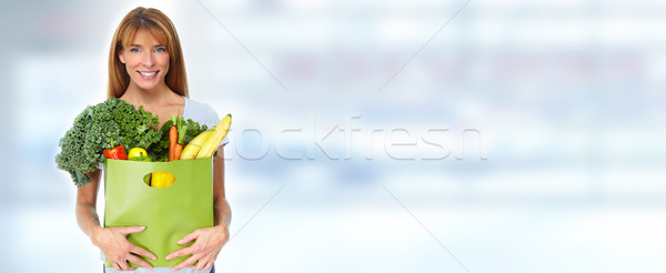 Kobieta spożywczy torbę na zakupy owoce warzyw niebieski Zdjęcia stock © Kurhan
