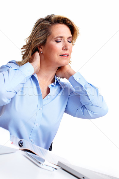Business woman having a headache. Stock photo © Kurhan