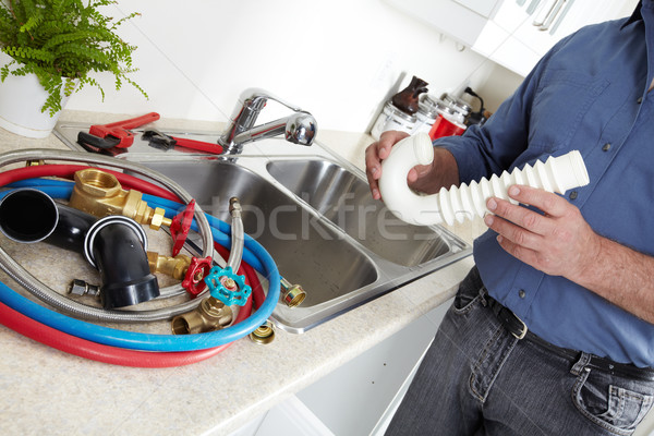 Kezek vízvezetékszerelő franciakulcs profi otthon háttér Stock fotó © Kurhan