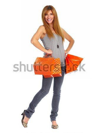 Stock photo: Shopping woman with paper bags.