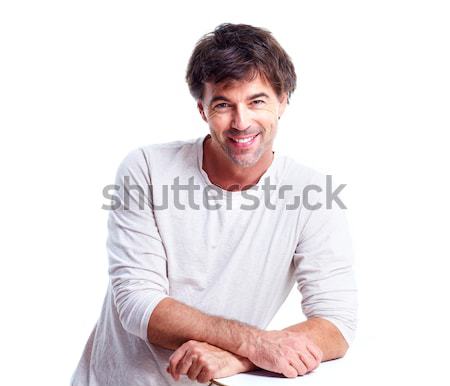 Feliz joven guapo sonriendo hombre aislado Foto stock © Kurhan