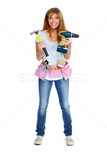 Woman with drill and hammer. Stock photo © Kurhan
