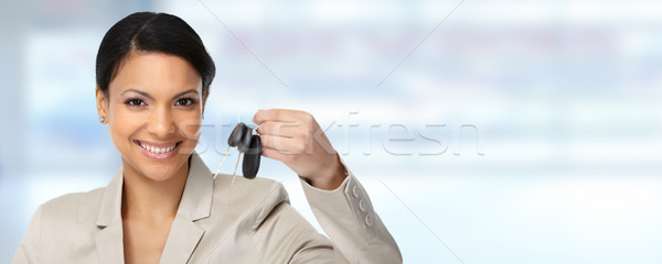 Auto dealer woman with a car key. Stock photo © Kurhan