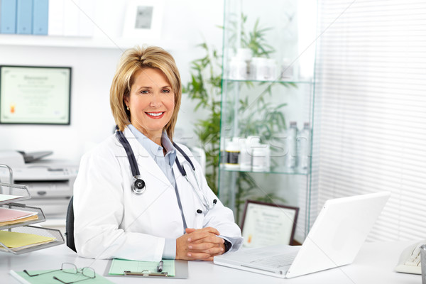 Mature doctor woman in a clinical office. Stock photo © Kurhan
