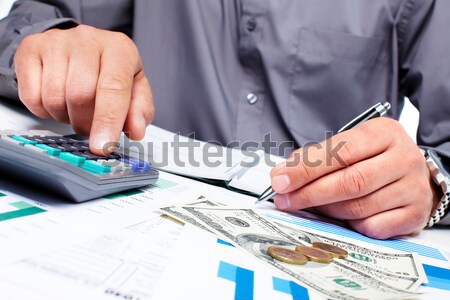 Accountant hands with calculator Stock photo © Kurhan