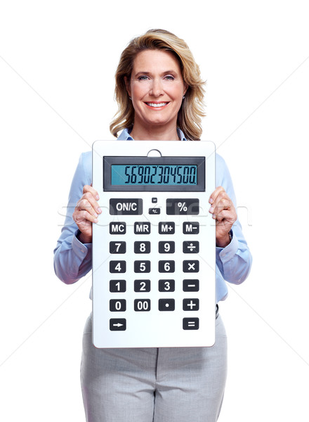 Accountant business woman with a calculator. Stock photo © Kurhan