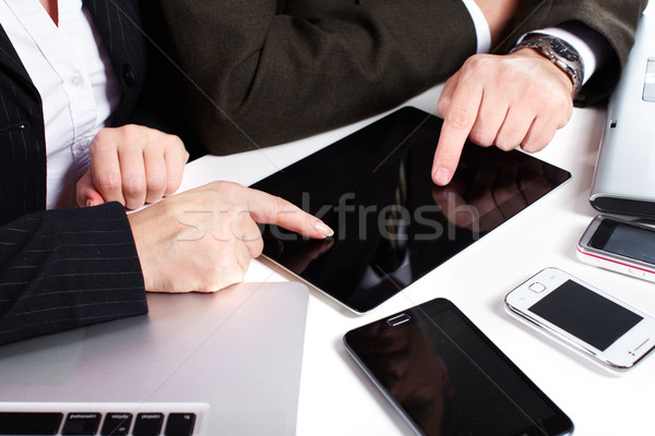 Business people group working with laptop. Stock photo © Kurhan