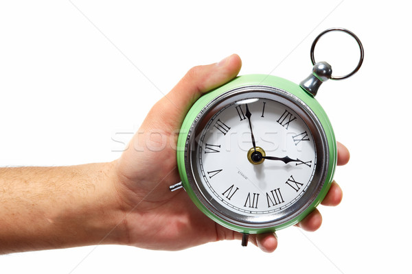 Hand with alarm clock. Stock photo © Kurhan