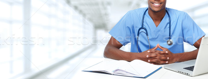 Hands of medical doctor man. Stock photo © Kurhan