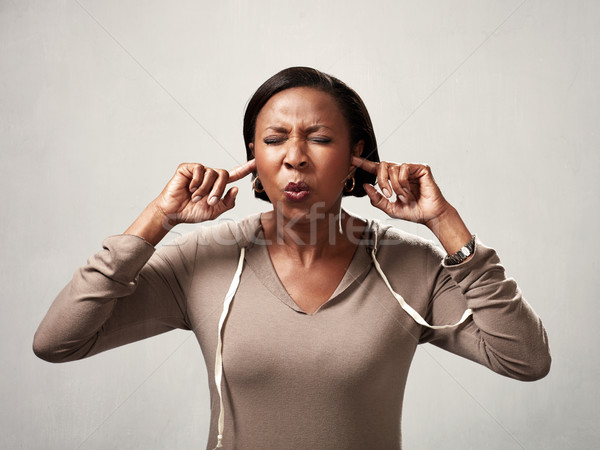 Black woman hearing anything Stock photo © Kurhan