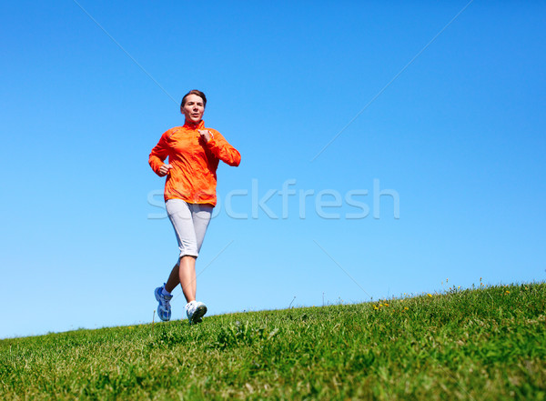 Jogging woman. Stock photo © Kurhan