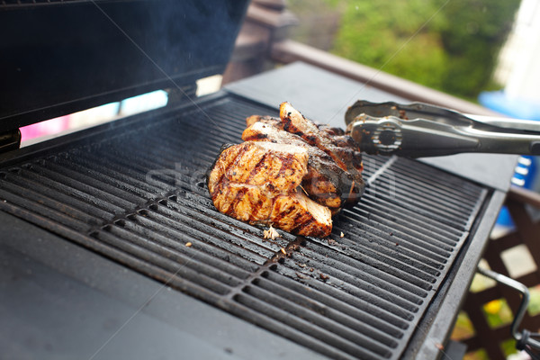 Salmon fish roast on barbecue grill. Stock photo © Kurhan