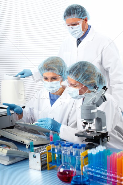 Group of medical doctors in laboratory. Stock photo © Kurhan