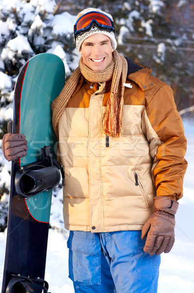 Snowboard genç mutlu gülen adam kış sporları Stok fotoğraf © Kurhan