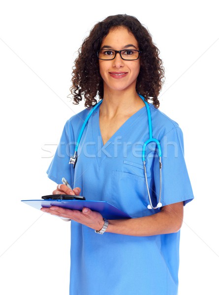 Medical doctor woman writing prescription Stock photo © Kurhan