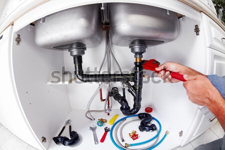 стороны водопроводчика ключа рук профессиональных сантехники Сток-фото © Kurhan