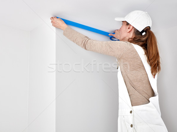 Stock photo: Woman with masking tape
