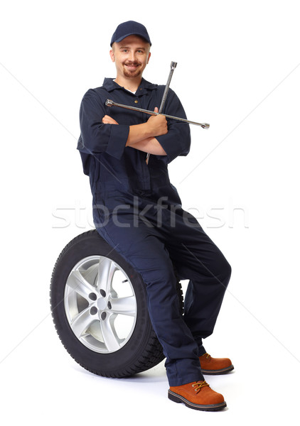 Carro mecânico pneu chave inglesa sorridente isolado Foto stock © Kurhan