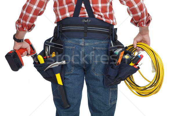 Electrician man with drill and wire cable. Stock photo © Kurhan