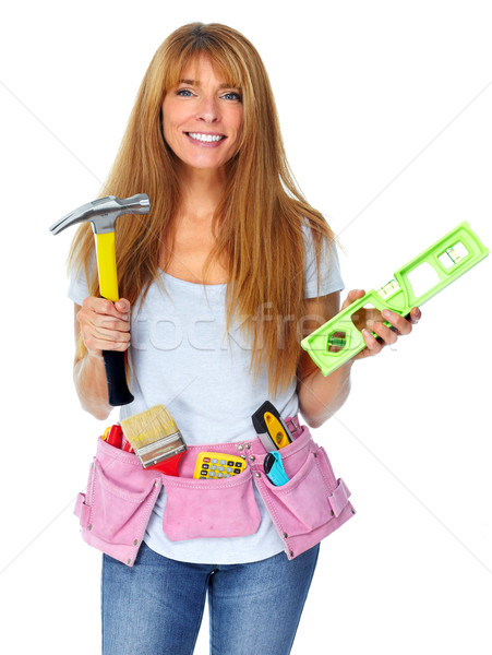 Stock photo: Woman with hammer.