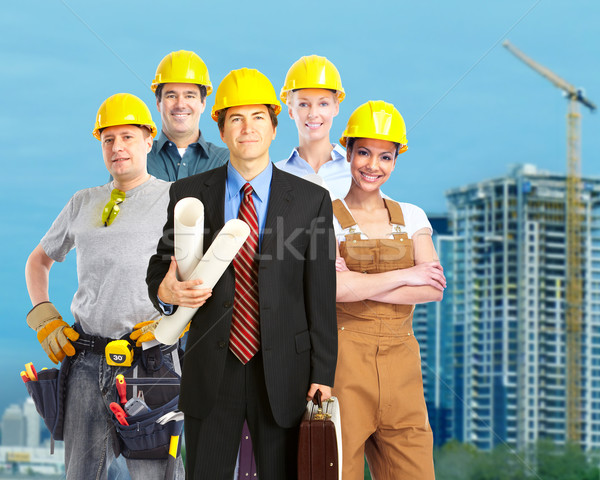 Stock fotó: Csoport · építkezés · munkások · építők · építőipar · férfi