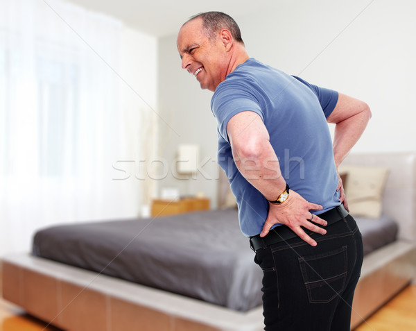 Senior om dureri de spate scadea sănătate problema Imagine de stoc © Kurhan