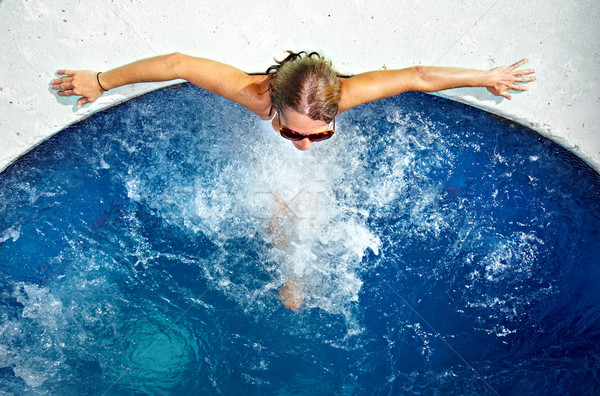 Woman relaxing in jacuzzi Stock photo © Kurhan